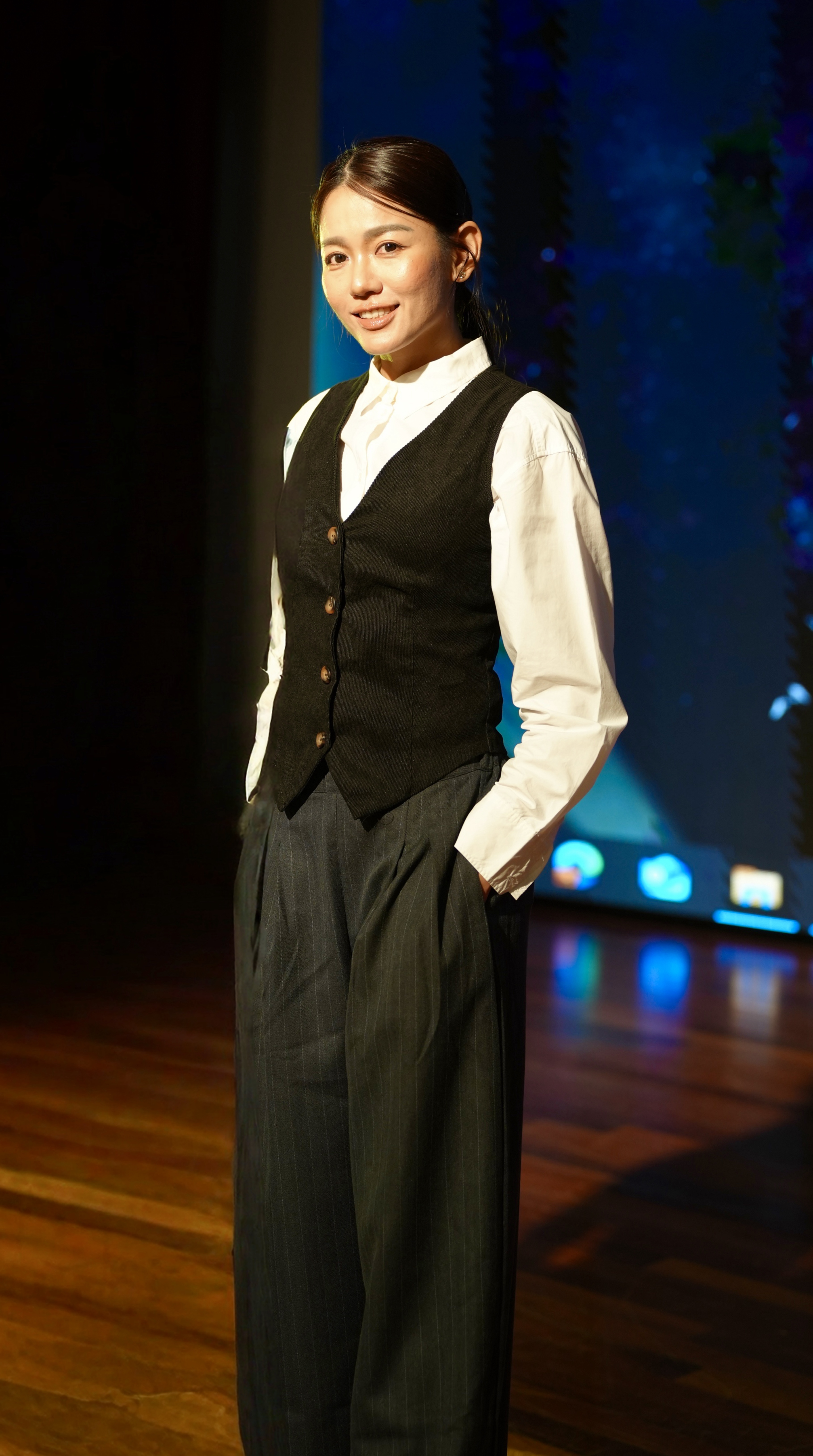 Rachael Ang speaking on stage